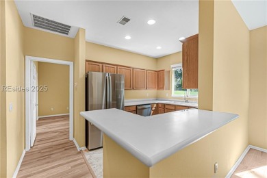 This two bedroom, two bath Hawthorne model has a great golf view on Okatie Creek Golf Club in South Carolina - for sale on GolfHomes.com, golf home, golf lot