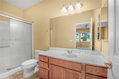 This two bedroom, two bath Hawthorne model has a great golf view on Okatie Creek Golf Club in South Carolina - for sale on GolfHomes.com, golf home, golf lot