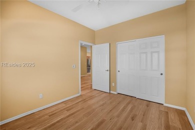This two bedroom, two bath Hawthorne model has a great golf view on Okatie Creek Golf Club in South Carolina - for sale on GolfHomes.com, golf home, golf lot