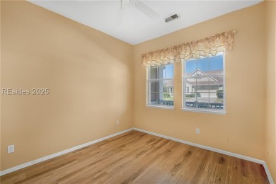 This two bedroom, two bath Hawthorne model has a great golf view on Okatie Creek Golf Club in South Carolina - for sale on GolfHomes.com, golf home, golf lot