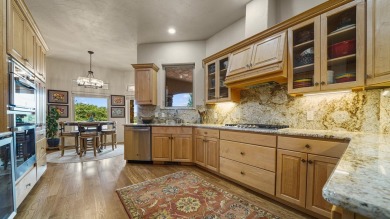 Discover luxury living at its finest in this stunning on The Golf Club At Redlands Mesa in Colorado - for sale on GolfHomes.com, golf home, golf lot