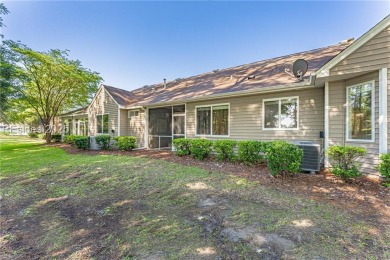 This two bedroom, two bath Hawthorne model has a great golf view on Okatie Creek Golf Club in South Carolina - for sale on GolfHomes.com, golf home, golf lot