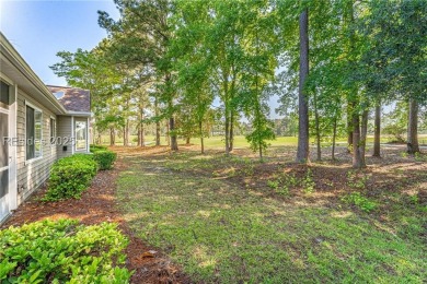 This two bedroom, two bath Hawthorne model has a great golf view on Okatie Creek Golf Club in South Carolina - for sale on GolfHomes.com, golf home, golf lot