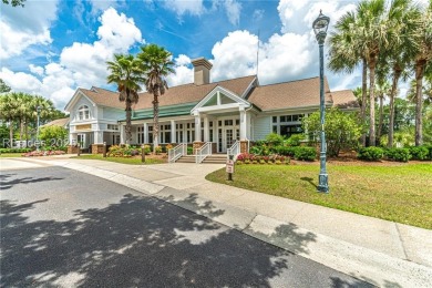 This two bedroom, two bath Hawthorne model has a great golf view on Okatie Creek Golf Club in South Carolina - for sale on GolfHomes.com, golf home, golf lot