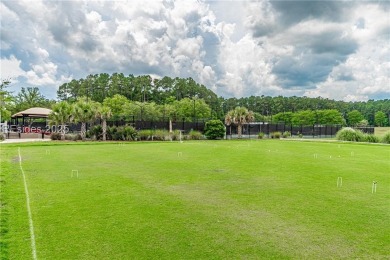 This two bedroom, two bath Hawthorne model has a great golf view on Okatie Creek Golf Club in South Carolina - for sale on GolfHomes.com, golf home, golf lot