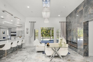 This lovely home, redesigned to be a peaceful retreat, is just a on The Wanderers Club in Florida - for sale on GolfHomes.com, golf home, golf lot