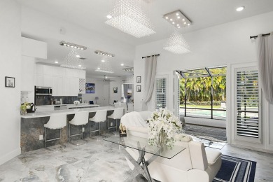 This lovely home, redesigned to be a peaceful retreat, is just a on The Wanderers Club in Florida - for sale on GolfHomes.com, golf home, golf lot