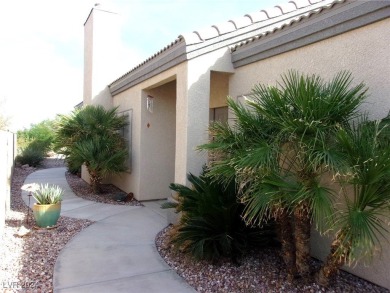 Nestled amidst the lush golf course greens and mountain vistas on Mojave Resort Golf Club in Nevada - for sale on GolfHomes.com, golf home, golf lot