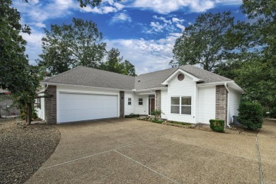 Welcome to your lakeside retreat on the desirable east side and on Granada Golf Course in Arkansas - for sale on GolfHomes.com, golf home, golf lot