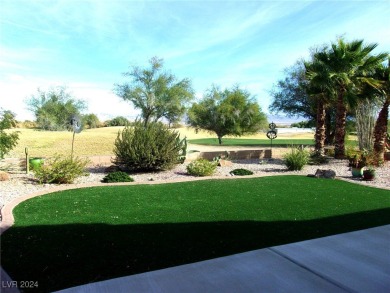 Nestled amidst the lush golf course greens and mountain vistas on Mojave Resort Golf Club in Nevada - for sale on GolfHomes.com, golf home, golf lot