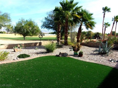 Nestled amidst the lush golf course greens and mountain vistas on Mojave Resort Golf Club in Nevada - for sale on GolfHomes.com, golf home, golf lot