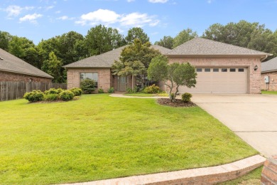 Welcome to this meticulously maintained home on a spacious lot on The Country Club of Arkansas in Arkansas - for sale on GolfHomes.com, golf home, golf lot