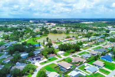 NEW PRICE!! NO HURRICANE DAMAGE OR FLOODING! EXTRAORDINARILY on Jacaranda West Country Club in Florida - for sale on GolfHomes.com, golf home, golf lot