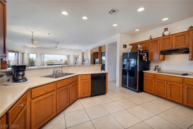 Welcome home to this beautiful Arlington floor plan which offers on Revere Golf Club in Nevada - for sale on GolfHomes.com, golf home, golf lot
