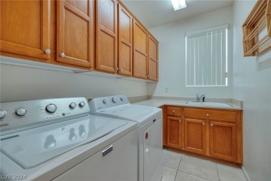 Welcome home to this beautiful Arlington floor plan which offers on Revere Golf Club in Nevada - for sale on GolfHomes.com, golf home, golf lot