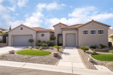 Experience the breathtaking mountain and city views in Sun City on Revere Golf Club in Nevada - for sale on GolfHomes.com, golf home, golf lot