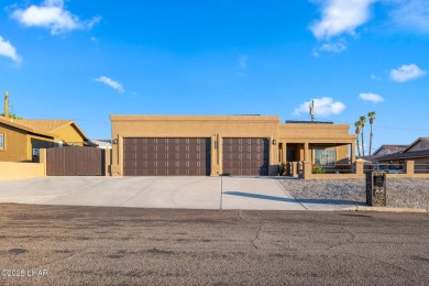 Gorgeous and rare four bedroom home on the tranquil south side on London Bridge Golf Course in Arizona - for sale on GolfHomes.com, golf home, golf lot