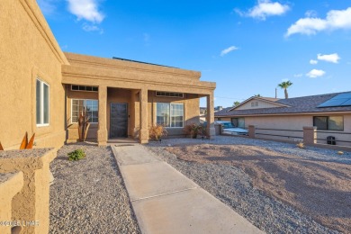 Gorgeous and rare four bedroom home on the tranquil south side on London Bridge Golf Course in Arizona - for sale on GolfHomes.com, golf home, golf lot