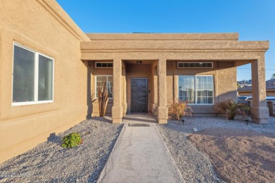 Gorgeous and rare four bedroom home on the tranquil south side on London Bridge Golf Course in Arizona - for sale on GolfHomes.com, golf home, golf lot