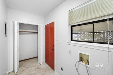 Welcome to this charming Creole cottage located near the Windsor on Lake Forest Yacht and Country Club in Alabama - for sale on GolfHomes.com, golf home, golf lot