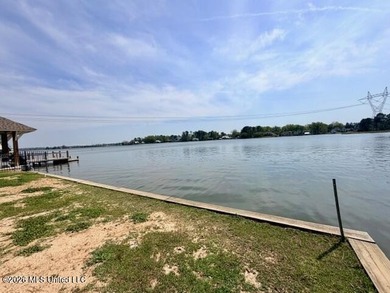 Prime waterfront lot in Lake Caroline ready for you to build on Lake Caroline Golf Club in Mississippi - for sale on GolfHomes.com, golf home, golf lot