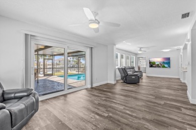 If you want to live in one of the most desirable waterfront on Gulf Harbors Golf Course in Florida - for sale on GolfHomes.com, golf home, golf lot