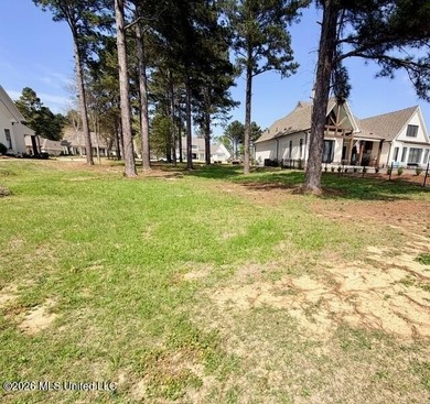 Prime waterfront lot in Lake Caroline ready for you to build on Lake Caroline Golf Club in Mississippi - for sale on GolfHomes.com, golf home, golf lot