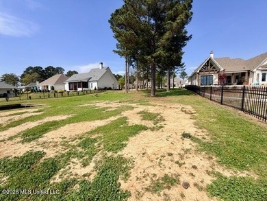 Prime waterfront lot in Lake Caroline ready for you to build on Lake Caroline Golf Club in Mississippi - for sale on GolfHomes.com, golf home, golf lot