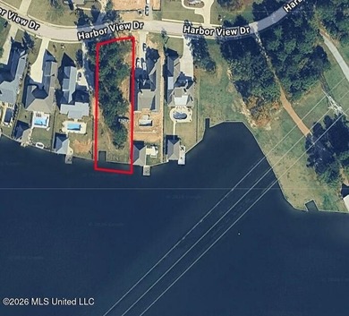 Prime waterfront lot in Lake Caroline ready for you to build on Lake Caroline Golf Club in Mississippi - for sale on GolfHomes.com, golf home, golf lot