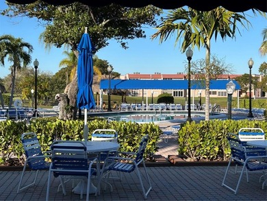 Spacious 2-bedroom, 2-bath first-floor condo in Sunrise Lakes on Sunrise Lakes Phase III in Florida - for sale on GolfHomes.com, golf home, golf lot