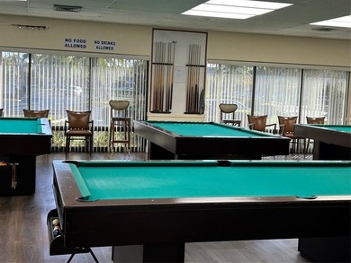 Spacious 2-bedroom, 2-bath first-floor condo in Sunrise Lakes on Sunrise Lakes Phase III in Florida - for sale on GolfHomes.com, golf home, golf lot