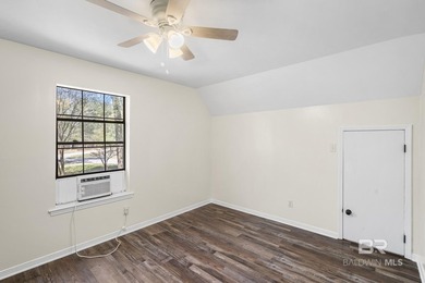 Welcome to this charming Creole cottage located near the Windsor on Lake Forest Yacht and Country Club in Alabama - for sale on GolfHomes.com, golf home, golf lot