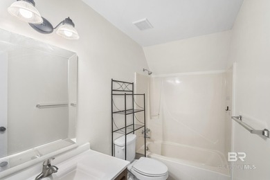 Welcome to this charming Creole cottage located near the Windsor on Lake Forest Yacht and Country Club in Alabama - for sale on GolfHomes.com, golf home, golf lot