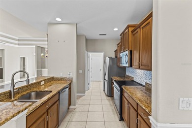 Welcome to this beautiful single-story home with many recent on River Strand Golf and Country Club At Heritage Harbour  in Florida - for sale on GolfHomes.com, golf home, golf lot