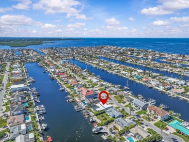 If you want to live in one of the most desirable waterfront on Gulf Harbors Golf Course in Florida - for sale on GolfHomes.com, golf home, golf lot