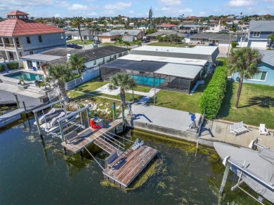 If you want to live in one of the most desirable waterfront on Gulf Harbors Golf Course in Florida - for sale on GolfHomes.com, golf home, golf lot