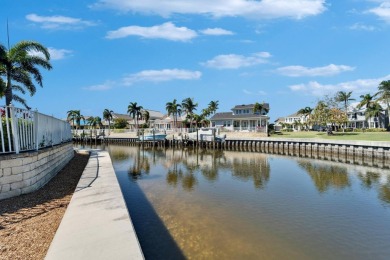 5616 Seagrass Place | Gulfview Floorplan 4 Beds | 4 Baths | Den on Apollo Beach Golf and Sea Club in Florida - for sale on GolfHomes.com, golf home, golf lot