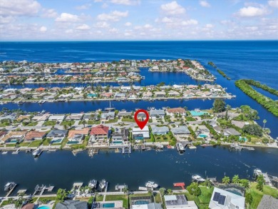 If you want to live in one of the most desirable waterfront on Gulf Harbors Golf Course in Florida - for sale on GolfHomes.com, golf home, golf lot