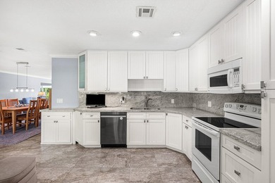 Beautifully renovated 3-bedroom, 2-bath second-floor condo on Quail Ridge Golf Course and Country Club in Florida - for sale on GolfHomes.com, golf home, golf lot