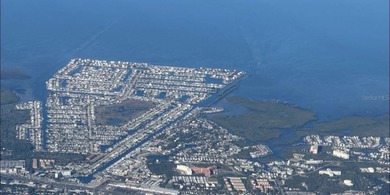 If you want to live in one of the most desirable waterfront on Gulf Harbors Golf Course in Florida - for sale on GolfHomes.com, golf home, golf lot