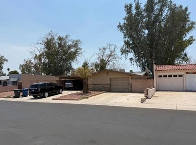 Discover this beautifully updated 3-bedroom, 2-bathroom golf on Chaparral Golf and Country Club in Arizona - for sale on GolfHomes.com, golf home, golf lot