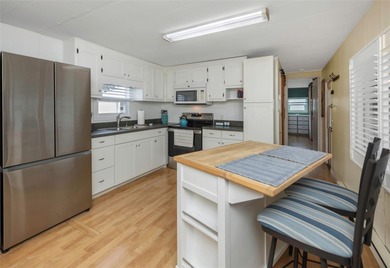 This adorable home has been meticulously and lovingly maintained on Fairway Village Golf Course in Florida - for sale on GolfHomes.com, golf home, golf lot