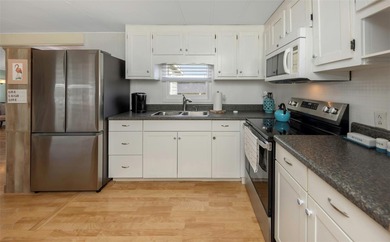 This adorable home has been meticulously and lovingly maintained on Fairway Village Golf Course in Florida - for sale on GolfHomes.com, golf home, golf lot