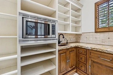 FALL IN LOVE WITH this EXQUISITE exceptionally built estate in on Indian Springs Country Club in Oklahoma - for sale on GolfHomes.com, golf home, golf lot