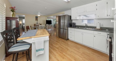 This adorable home has been meticulously and lovingly maintained on Fairway Village Golf Course in Florida - for sale on GolfHomes.com, golf home, golf lot