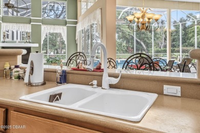 Welcome to 1766 Roscoe Turner Trail, a distinguished luxury on Spruce Creek Golf Club in Florida - for sale on GolfHomes.com, golf home, golf lot