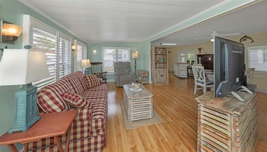 This adorable home has been meticulously and lovingly maintained on Fairway Village Golf Course in Florida - for sale on GolfHomes.com, golf home, golf lot