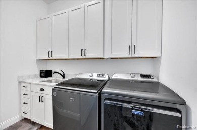 Skip the hassle of building and move right into this like-new on Metamora Country Club in Michigan - for sale on GolfHomes.com, golf home, golf lot
