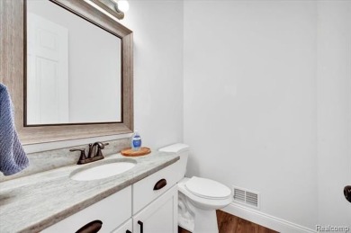 Skip the hassle of building and move right into this like-new on Metamora Country Club in Michigan - for sale on GolfHomes.com, golf home, golf lot