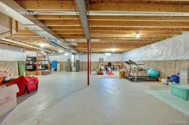 Skip the hassle of building and move right into this like-new on Metamora Country Club in Michigan - for sale on GolfHomes.com, golf home, golf lot